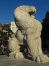 Monumental stone statue of a big adult lion in Amsterdam