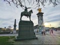 3 monuments an obelisc, a golden angel and a commander of the army on Paris