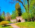 Monza Royal Gardens with lush greenery and preserved medieval buildings, Italy