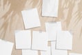 Moodboard template composition with blank photo cards, torn paper, square frames glued with adhesive tape on light coffee color Royalty Free Stock Photo