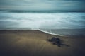 Moody calm rocky sea.