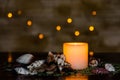 Moody candlelight with a nice fuzzy light bokeh. Perfect for the spa. Royalty Free Stock Photo