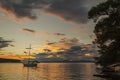 Moody clouds clouds during sunset over Adriatic bay in Splitska on Brac island, Croatia Royalty Free Stock Photo