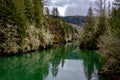 The Long, More Expansive View of the Cowlitz River with Moody Clouds Royalty Free Stock Photo