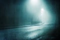 A moody concept of a road with street lights on a foggy night. With a grunge, artistic, edit