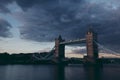 Moody dark shot of Tower Bridge on London skyline at sunset