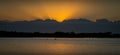 Moody estuary sunrise over the sand and mud flats Royalty Free Stock Photo