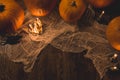 Moody evening on Halloween night carving pumpkins. Royalty Free Stock Photo