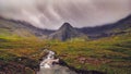 Moody landscape view of Cuillin hills with river in foreground, Scotland Royalty Free Stock Photo
