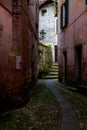 Moody morning at the narrow streets of Argengo, Italy