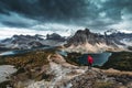 Moody of Nublet peak with mount Assiniboine and hiker standing in autumn at national park Royalty Free Stock Photo