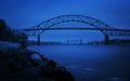 Infrared Blue landscape of Bourne Bridge over Cape Cod Canal Royalty Free Stock Photo