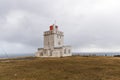 Moody photo of a famous Dyrholaey light house in Iceland