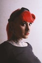 Moody portrait of girl with piercings and tattoos