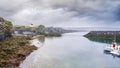 A moody, rainy day in a boat harbor in Iceland. Royalty Free Stock Photo