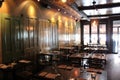 Moody scene inside restaurant with old doors used for decoration, Boca Bistro, Saratoga Springs, New York, 2019