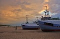 Moody sky over fishing boats