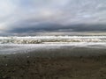 Moody sky over ocean coastline