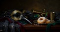 Dark still life with carnival mask and sweets Royalty Free Stock Photo