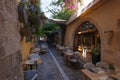 Moody street and taverna in Rethymno Greece