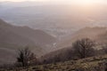 Moody sunset on Monte Cucco Umbria, Italy, with tree in the foreground Royalty Free Stock Photo
