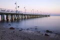 Moody twilight over pier in gdynia orlowo on Baltic sea in poland Royalty Free Stock Photo