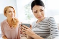 Moody upset woman drinking tea Royalty Free Stock Photo