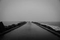 Moody walk on the pier Royalty Free Stock Photo