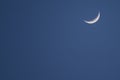 Moon at the beginning of the month at night Royalty Free Stock Photo