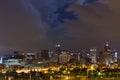 Moon Behind Clouds Above The Denver Skyline Royalty Free Stock Photo