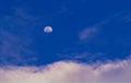 moon in the blue sky and white clouds Royalty Free Stock Photo