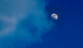 the moon in the Blue sky and white clouds Royalty Free Stock Photo