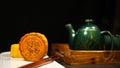 Moon cake with tea. Chinese celebration and asian tradition. Baked oriental pastry for mid autumn