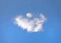 Moon sitting on cloud like egg in nest