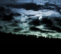 Moon and cloudscape at night Royalty Free Stock Photo