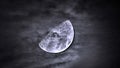 Moon in cloudy sky and dramatic dark clouds Royalty Free Stock Photo