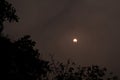 The moon covers the sun in a beautiful solar eclipse in Indian dark sky Royalty Free Stock Photo