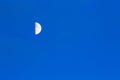 Moon crescent close-up on blue sky as background Royalty Free Stock Photo
