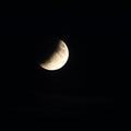 The moon in a dark sky half eclipse Royalty Free Stock Photo