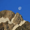 Moon going down over Mt Altmann Royalty Free Stock Photo