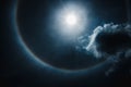 Moon halo phenomenon. Nighttime sky and bright full moon with sh Royalty Free Stock Photo