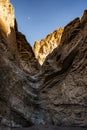 Moon High Above Mosaic Canyon Dry Fall In Death Valley