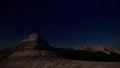 Night starry sky above the moon looking stone canyon in Kasakhstan time lapse 4K