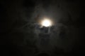 Moon Nesting in the Clouds Royalty Free Stock Photo