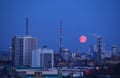 Moon over the city, night sky Royalty Free Stock Photo