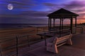 Moon over boardwalk by the sea