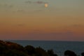 Moon over Cala Llenya Royalty Free Stock Photo