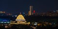 Moon over the city at night. Moscow Royalty Free Stock Photo