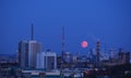 Moon over the city, night sky Royalty Free Stock Photo