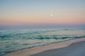 Moon over the Gulf of Mexico at sunrise, in Panama City Beach, Florida Royalty Free Stock Photo